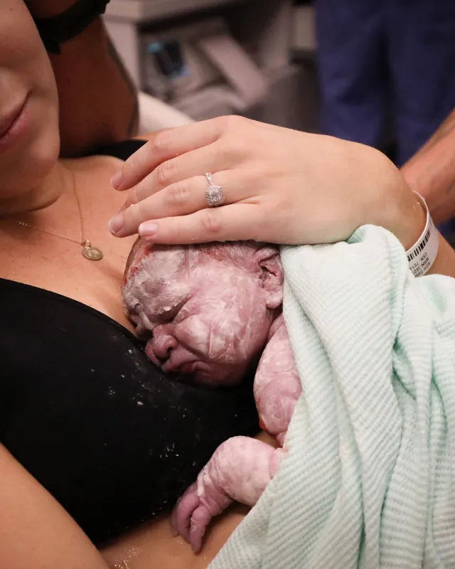 Skin to skin in the first minutes after birth, Orange County birth photography by Jenn Miller